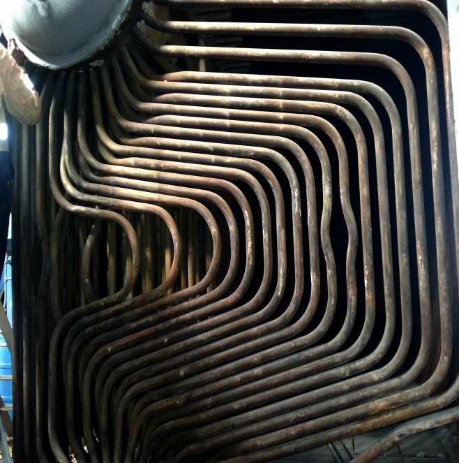 Tube bending boiler end-wall